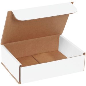 A partially open MH-USA 7 x 5 x 2 white corrugated mailer with a brown interior rests against a plain backdrop. It has no visible markings or labels and is available in bundles of 50 for versatile packaging needs.