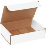 The MH-USA 7 x 5 x 2 White Corrugated Mailer, available in a 25-pack, features a partially open lid showcasing its roomy brown interior, perfect for protecting your items.