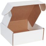A plain MH-USA 10 x 10 x 4 White Deluxe Literature Mailer from a 50/bundle set is open with its lid up, showing the brown interior. Ideal for packaging or storage, it rests on a simple background highlighting its sturdy design.