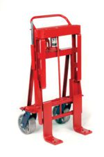 The Vestil Vend. Machine-Furn. Movers 8000 Lb Cap is a red hydraulic hand truck with a sturdy metal frame, vertical handle, two large wheels, and extended prongs for stability, capable of lifting and transporting up to 8000 lbs in heavy objects.