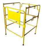 The Vestil Man Hole Guard Rail Up To 32 is a yellow metal safety barrier for indoor use, featuring sturdy rails and a central panel. Its lightweight, portable, and easily opens for access, perfect for construction sites or restricted areas.