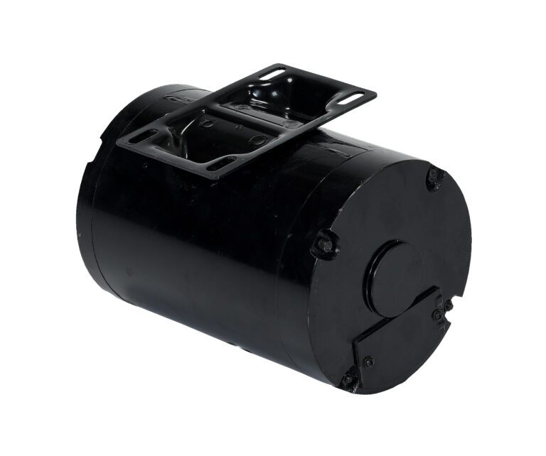 This black cylindrical metal item, a Vestil 575/660V Motor/Transformer for a 2Hp unit, features a bracket on top. Its smooth surface with bolts and a protruding circular section on one end highlights its mechanical precision and robust design.