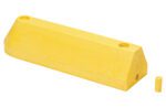 A Vestil Modular Guard Curb - End Section, yellow and trapezoidal with rounded edges and two top holes, is textured. A small cylindrical piece accompanies it to complete the set.