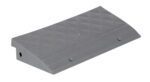 A gray rubber wheel chock with a diamond-patterned surface and a sloped design, featuring securing holes to stop vehicle rolling, shares the rugged design of the Vestil High Impact Multi-Purpose Ramp 23X10.5.