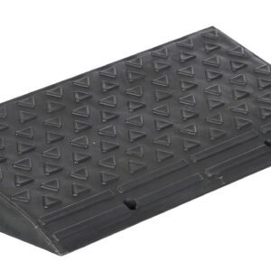 The Vestil High Impact Multi-Purpose Ramp 23.8X10.6 is a black, rectangular rubber wedge with a textured surface featuring raised triangles. It has a sloped edge and side holes for mounting or securing, measuring 23.8x10.6 inches for versatile use.