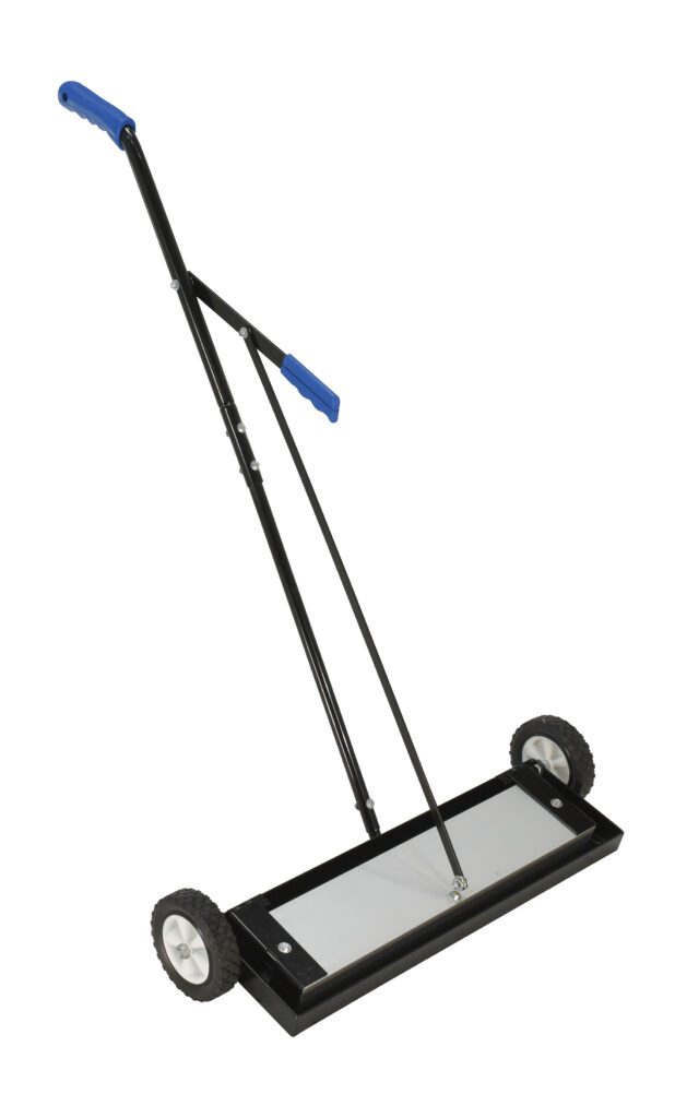 MPSR-24-B_A.jpg The Vestil Magnetic Sweeper Bended Handle 24 In features a rectangular base, two wheels, and blue grips. This black sweeper efficiently collects metal debris with an adjustable handle that tilts backward for easy maneuverability.