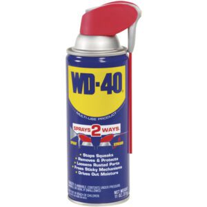The WD-40® 11 oz. Spray Can with Smart Straw, available in cases of 12, features a blue can with a red nozzle for spray/stream options. It stops squeaks, removes rust, frees sticky mechanisms, and drives out moisture.