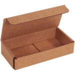The 6 1/2 x 3 1/4 x 1 1/4 Kraft Corrugated Mailers feature a brown hinged lid, revealing an unmarked, empty interior. Its minimalist rectangular design with clean edges is ideal for simple mailing needs. Sold in bundles of 50.