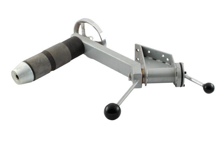 The Vestil Work Positioner Optional Reel Rotator is a mechanical device with a long arm, two black-handled levers, a cylindrical metal component, and a metallic base with bolt holes for mounting.