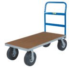 The Little Giant Platform Truck with Alternative Deck Surfaces has a blue metal frame and handle, large black wheels, and a wooden deck. Its ideal for moving heavy items in warehouses or workshops, offering different deck surface options to meet various needs.