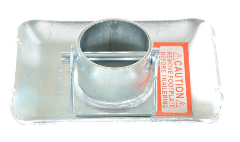 The Vestil Trailer Jack Nose Base Pad includes a sturdy rectangular metal foot plate with a cylindrical holder and pin, featuring a bold red label warning, CAUTION REMOVE FOOT PLATE BEFORE TRAILERING, for added safety.
