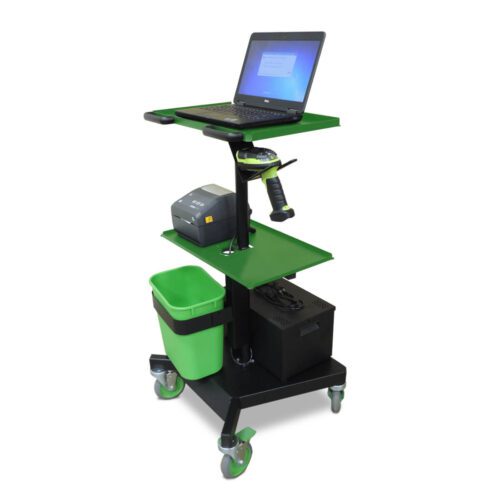 A mobile workstation featuring a laptop on the top shelf, a barcode scanner, and a printer on the middle shelf. A green waste bin is attached to the side. The unit is on four wheels for easy movement.