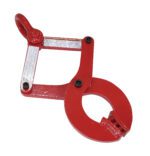 This red metal lifting clamp resembles the Vestil Single Scissor Pallet Puller 6K 5 In Jaw, featuring a hook and loop design with a round grip and rectangular handle. It includes secure bolts and labels for safely lifting heavy objects.