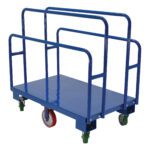 The sturdy blue Vestil Vertical Panel Cart 2K Lb 47.5 X 30.25 features multiple vertical bars and vibrant wheels—a red front wheel and green rear wheels—ideal for efficiently transporting large, flat objects like panels or boards.