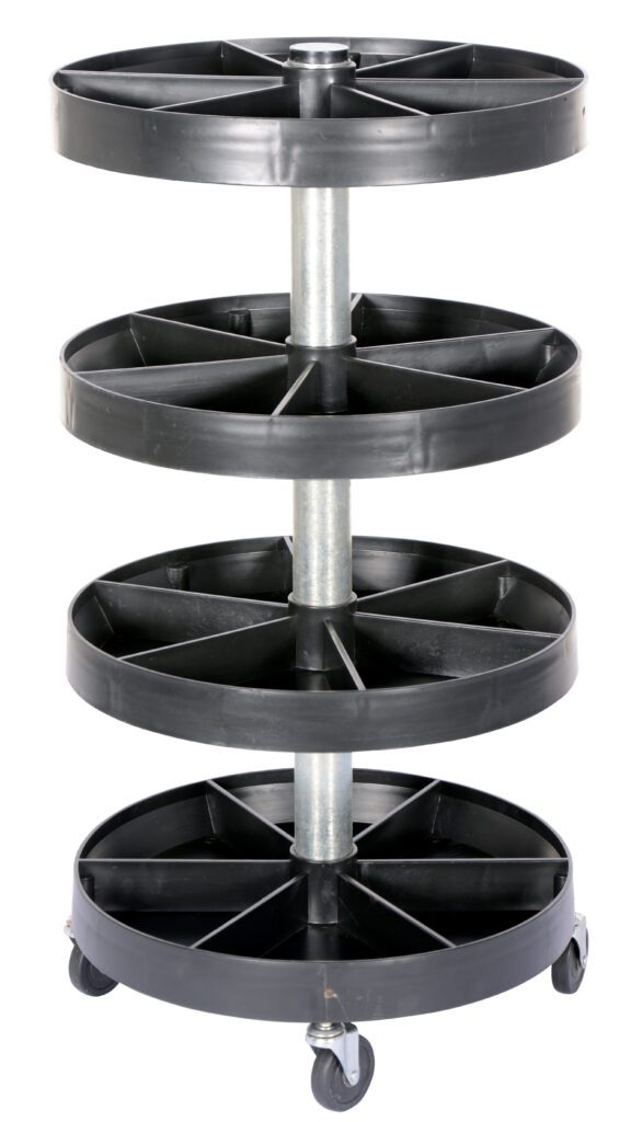 The Vestil Portable Parts Bin 220 Lb 19.5 X 19.5 is a compact, vertical four-tier black trolley with circular trays on metal supports and small wheels for easy mobility, capable of holding up to 220 lbs.