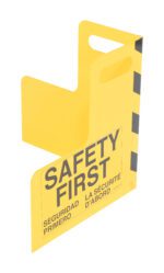 This yellow safety tag features a handle and the SAFETY FIRST message in English, Spanish, and French. Designed to complement the Vestil Plate Corner Guard W/Handle Steel 16 X 16 In., its bold black diagonal stripes ensure high visibility.