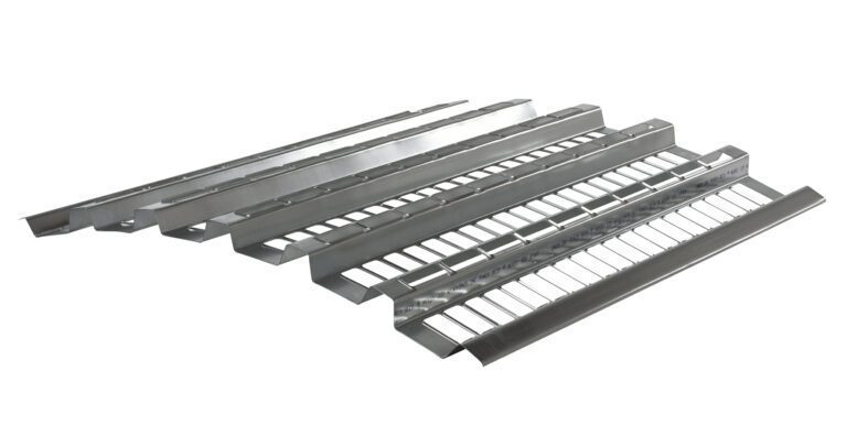 PCH-108_A.jpg Vestil Open-Area Pallet Rack Decking, 38.5 X 108, with ridged surfaces and narrow openings, is stacked diagonally on a white background.