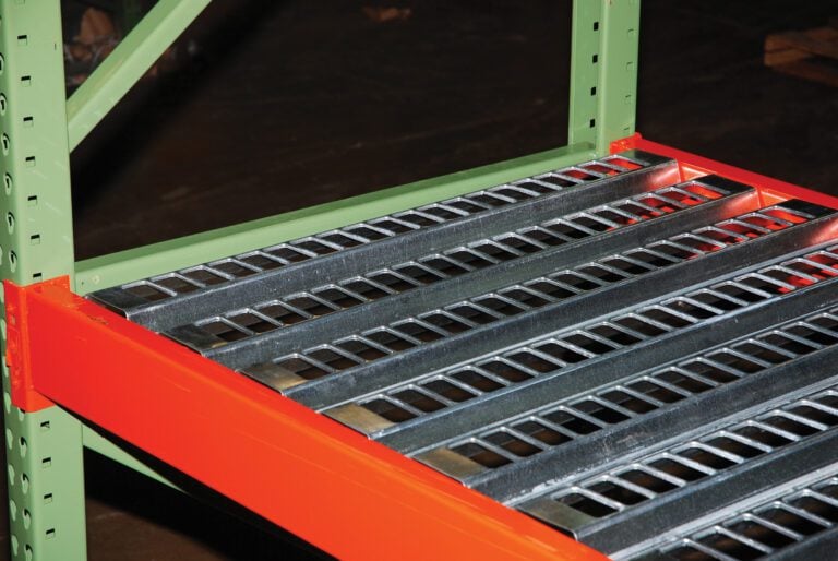 PCH-120_A.jpg A close-up of metal shelving reveals a sturdy green frame and red support beams, featuring Vestil Open-Area Pallet Rack Decking 38.5 X 120 as the shelf surface, perfect for industrial or warehouse storage.