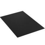 One matte black sheet from the MH-USA 24 x 18 Black Plastic Corrugated Sheets (10/Bundle) sits angled on a white background. It features sharp edges and a smooth surface, offering a striking contrast.