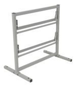 The Vestil Paper Dispenser Stand-2 Tier 24 In Wide has a white adjustable metal frame with two horizontal beams and sturdy legs, ideal for supporting a tabletop. It features visible hinges and joints for easy folding and height adjustment.