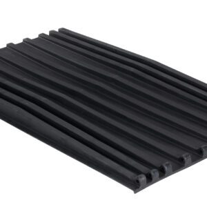 A black rectangular rubber mat with horizontal raised parallel ridges, similar in design to the Vestil Poly Lid For Size 1.5 Style D Hopper, has pointed edges and a slightly glossy surface.