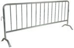 The Vestil Hd Galvanized Barrier W/Curved Feet is a silver metallic crowd control barrier featuring vertical bars and curved legs. Ideal for temporary use at events or construction sites, it efficiently manages pedestrian flow and boosts safety.