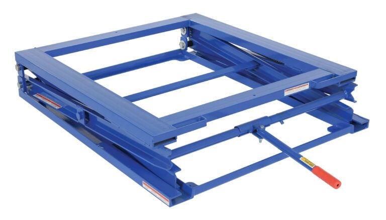 PS-4045_A.jpg The scissor lift table, matching the Vestil Adjustable Pallet Stand 5000 Lb, features a manual hydraulic pump handle. It is collapsed, showcasing its robust metal frame and unique red-tipped handle on one side.