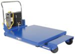 A blue electric platform cart features a four-wheel design, metal handle, and control box with a yellow coiled cable. Inspired by the Vestil Heavy Duty Portable Lift Table 1K 46 In, it has a flatbed that is ideal for effortlessly transporting heavy items.