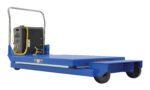 The Vestil HD Portable Scissor Lift Table 2K 46 In is a blue electric lift cart with a flat platform, black wheels, and a metal handle. It includes a yellow coiled cable connected to the control box on one side.