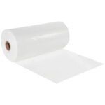 A large roll of MH-USA 7 x 1450 - 3 Mil Poly Tubing (1450/Roll) is partially unrolled on a plain white background, showcasing the smooth and shiny material and revealing a cylindrical cardboard core at the center.