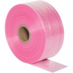 A large roll of MH-USA 5 x 2150 - 2 Mil Anti-Static Poly Tubing, featuring a cardboard core, unfurls to reveal a flat section. The pink material has a glossy finish that reflects light.