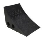 The Vestil Recycled Black Plastic Wheel Chock is a durable, triangular black rubber safety tool with a textured surface and two side holes to effectively prevent vehicle movement.