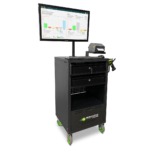 A black mobile workstation cart with green wheels, featuring drawers and a monitor displaying graphs and charts. A barcode scanner is attached to the top surface. The cart is branded with a NEWCASTLE logo.