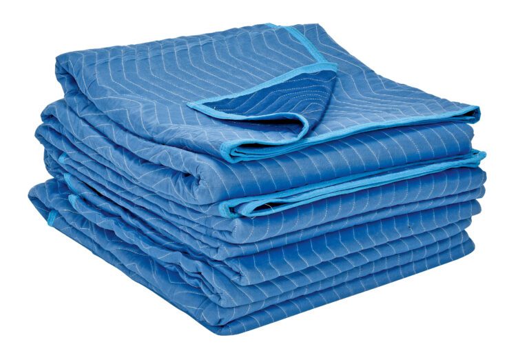 The image shows a neatly folded stack of blue Vestil All Weather Moving 4 Pads against a white background. This 4-pack features light blue trim, is made from durable polyester, and has quilted texture for dependable protection during moves.