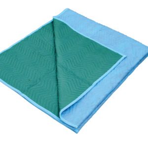 A folded blanket with a blue exterior and green interior displays a zigzag quilted design, reflecting the style and durability of Vestil Heavy Duty Moving Pads in a premium polyester/cotton blend.