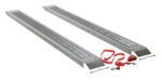 The Vestil Steel Van Ramps (Set Of 2) 96 X 18 X 2 boast a durable, anti-slip surface and parallel alignment on the ground. An adjacent red ratchet strap with hooks and a tensioning mechanism secures loads. The ramps angled ends facilitate easy access.