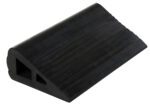 The Vestil Industrial Rubber Wedge 6.75 X 12 is a black triangular wheel chock with a ribbed surface, crafted to prevent vehicle movement.