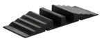 The Vestil Molded Rubber Hose/Cable Crossover 2.4K, a black rubber parking curb with ridges and slots, protects tires and wheel rims from damage with its textured surface, supporting and stabilizing parked vehicles effectively.