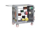 The Little Giant Wire Reel Cart with Pegboard or Louvered Panels, featuring red wheels, displays an array of cable spools. Its convenient handles and mounted reel system complement the tools hanging on the louvered panels, creating a sleek design against the plain white background.