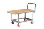 The Little Giant Ergonomic Work Height Platform Truck features a wooden-top flatbed utility cart, sturdy metal frame, and a bright blue handle. It moves easily with four red wheels designed for smooth mobility.