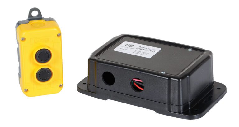 A black rectangular electronic device with a label and wires is next to the yellow Vestil Radio Remote Control 2 Button, a handheld remote used for efficient industrial equipment management.