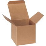 An open 4 x 4 x 4 Kraft Reverse Tuck Folding Carton, flaps extended outward against a white background, is photographed from an angled, slightly elevated perspective. This sturdy carton comes in bulk cases of 250.