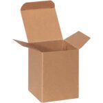 A brown cardboard box, 3 x 3 x 4, with an open top and outward flaps, like the Kraft Reverse Tuck Folding Cartons (250/Case), is positioned against a plain white background.