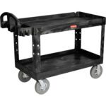 Meet the Rubbermaid® Utility Cart, sized 54 x 25 x 33. This black two-shelf cart features a handle, four gray wheels, a raised edge top shelf, and small compartments. Its robust and industrial for versatile work environments.