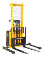 The Vestil Adjust Powered Lift Stacker 62 In Raised is a yellow and black manual pallet stacker with a vertical lift, two long forks, handles, and a mesh screen for clear visibility, ideal for warehouse use.