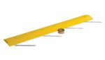 A yellow ramp with a black textured surface and metal spikes, resembling the Vestil Speed Bump-Asphalt Hardware 72 X 10 X 2, is designed for asphalt. Nearby, a roll of brown tape sits on the plain white backdrop.