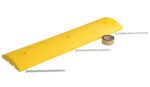 The Vestil Speed Bump-Asphalt Hardware 48X12X2.25 is a yellow rubber bump featuring three metal stakes, double-sided tape, and three pre-drilled holes for secure ground installation.