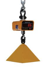 The Vestil Crane Scale, product name Vestil Crane Scale W/600 Lb Capacity 8 X 7.625, weighs 8.6 pounds and features a black hook and shackle for lifting a yellow, triangular weight up to 600 lbs.