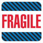 The labels feature bold red FRAGILE text on a white background, framed with blue and black diagonal stripes, similar to MH-USAs 4 x 4 Fragile Labels (500/Roll) for a professional appearance.