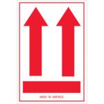 The MH-USA 4 x 6 Inside Packages Comply... Arrow Labels feature a white label with two large red upward arrows and a red line below. The text MADE IN AMERICA is at the bottom. These stickers ensure compliance and visibility, available in rolls of 500 labels.